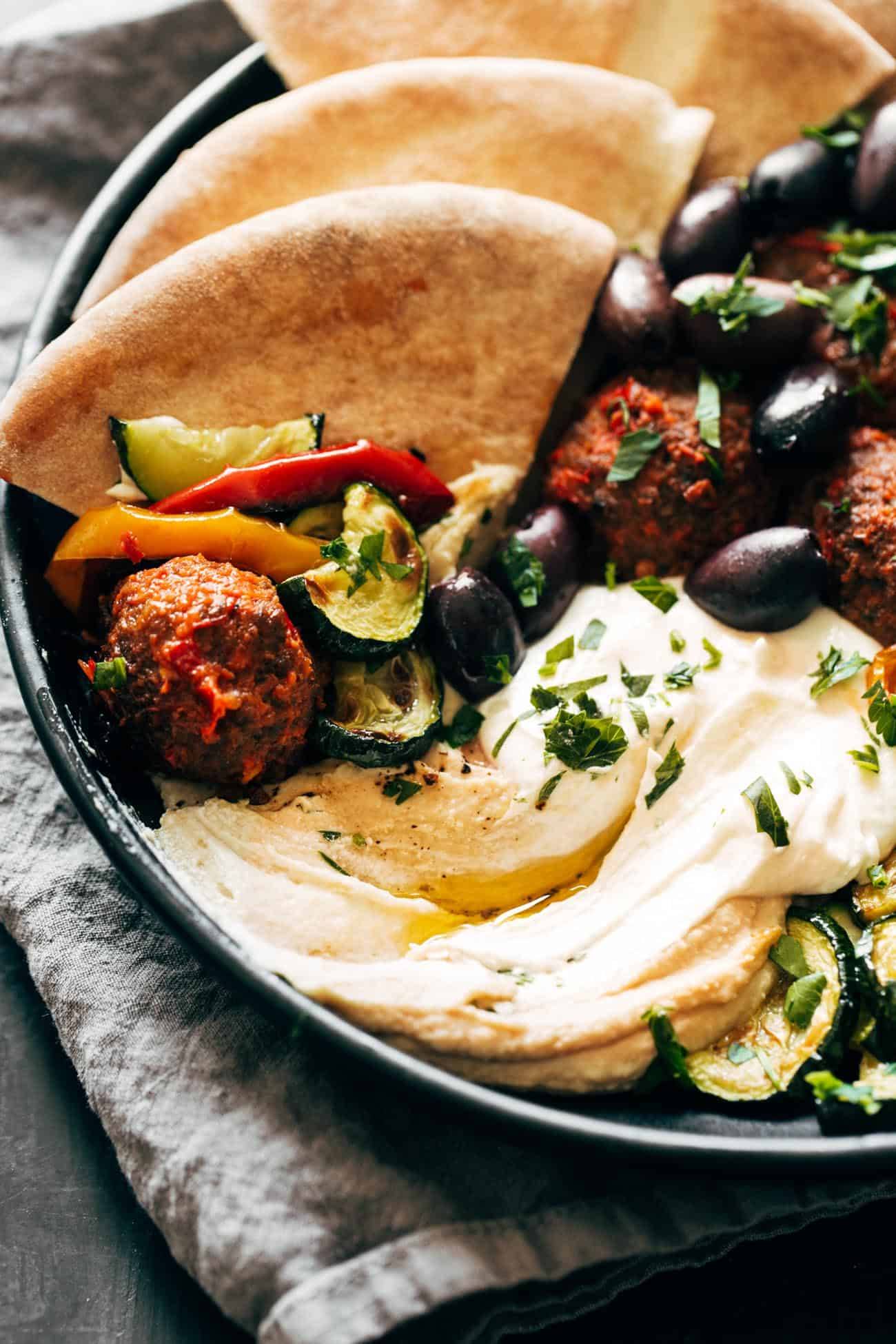 Close-up of Harissa Meatballs with Whipped Feta in a bowl