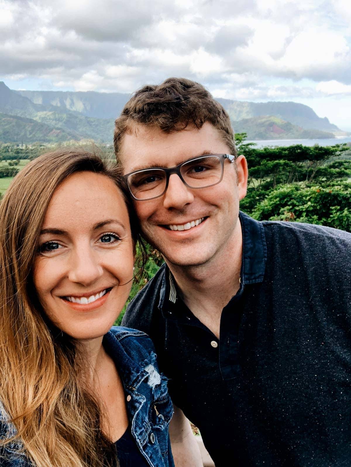 Man and woman smiling.