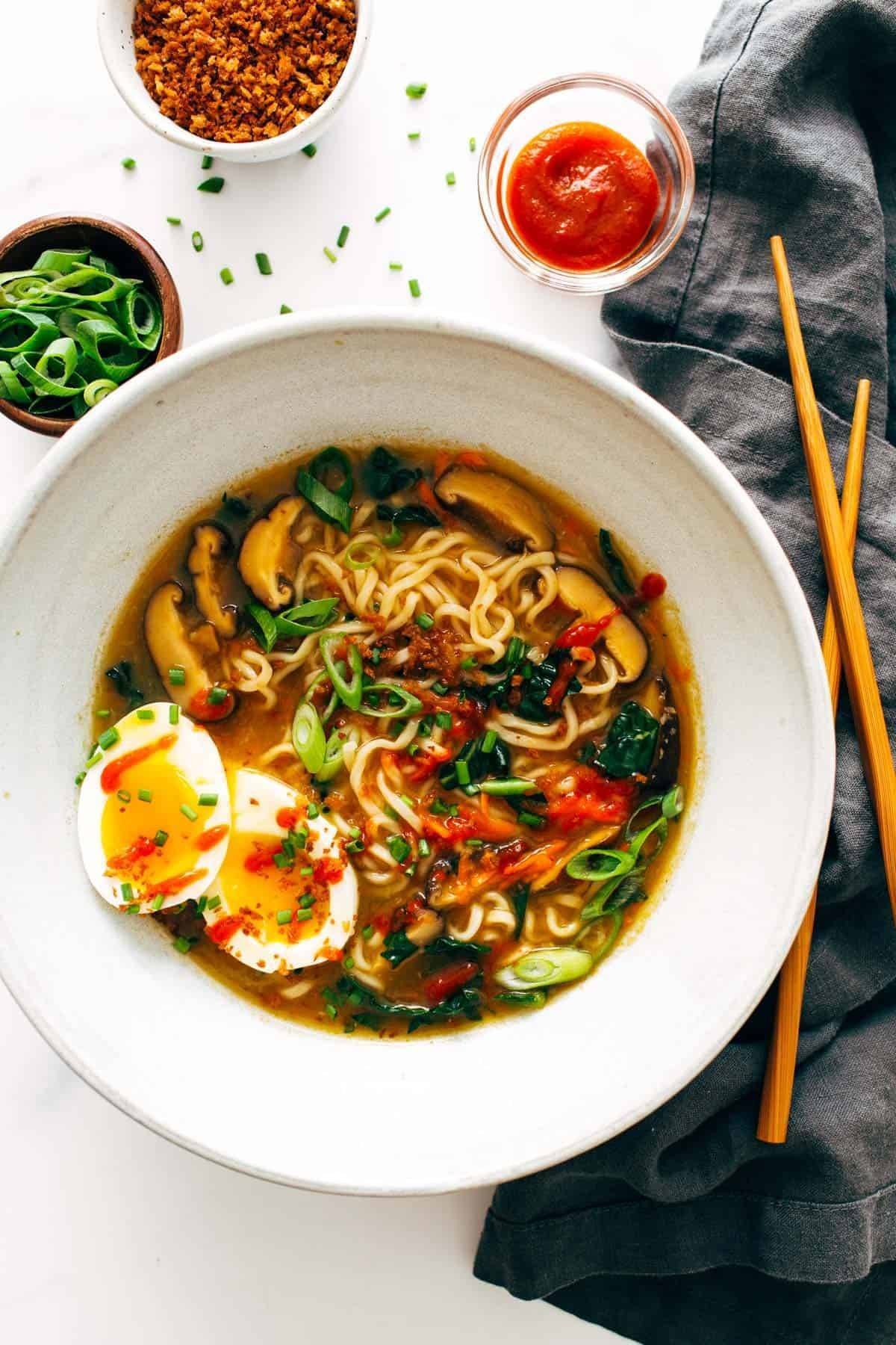 Quick Homemade Ramen in a bowl with soft egg and chopsticks. 