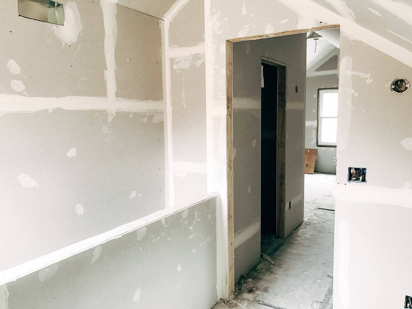 A white attic being remodelled.