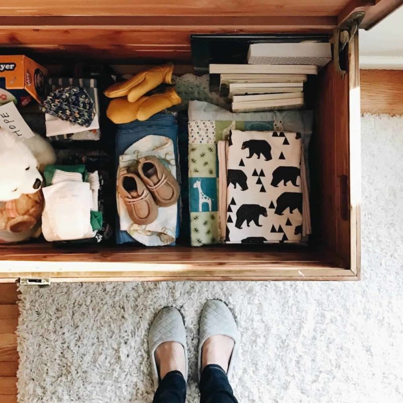 Baby items in a chest.