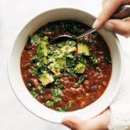 Instant Pot Pumpkin Walnut Chili in bowl with spoon.