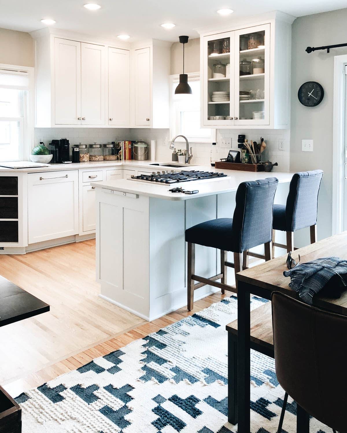 Kitchen with rug.