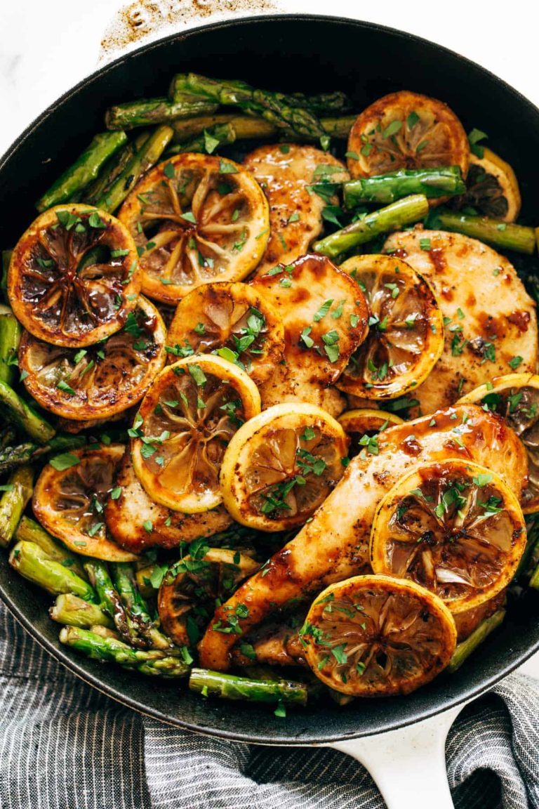 Lemon chicken with asparagus in a pan