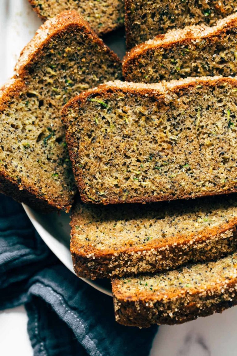 Slices of lemon zucchini bread in a bowl.