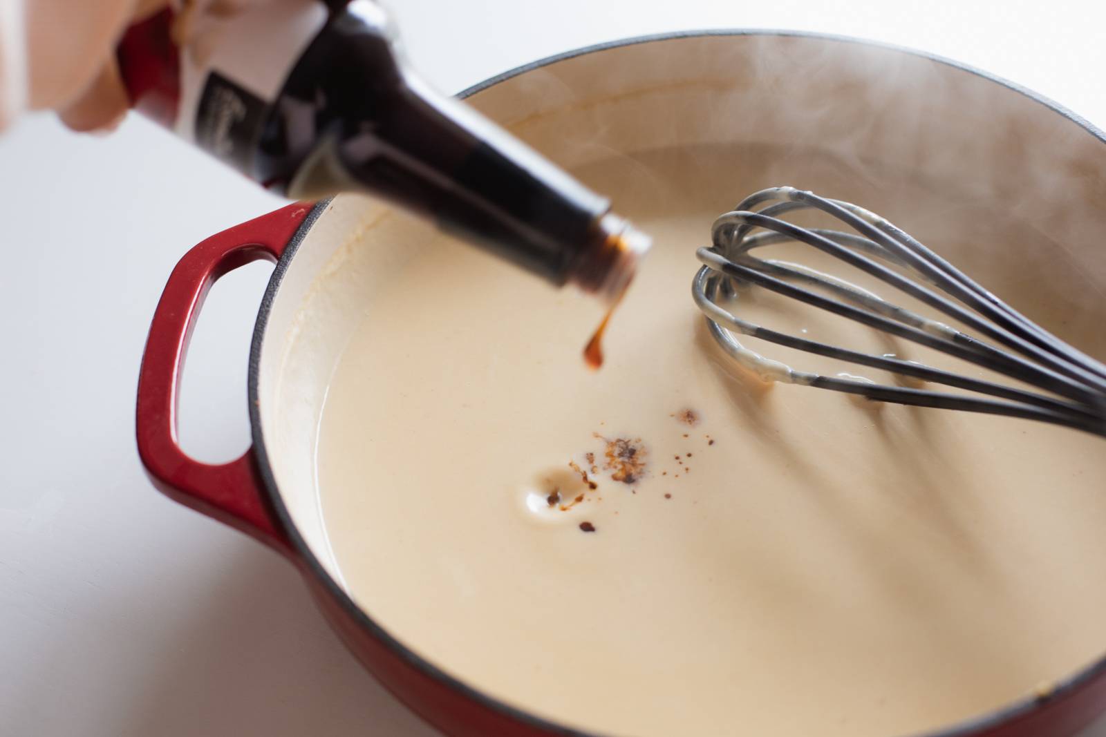 Adding worcestershire sauce to gravy.