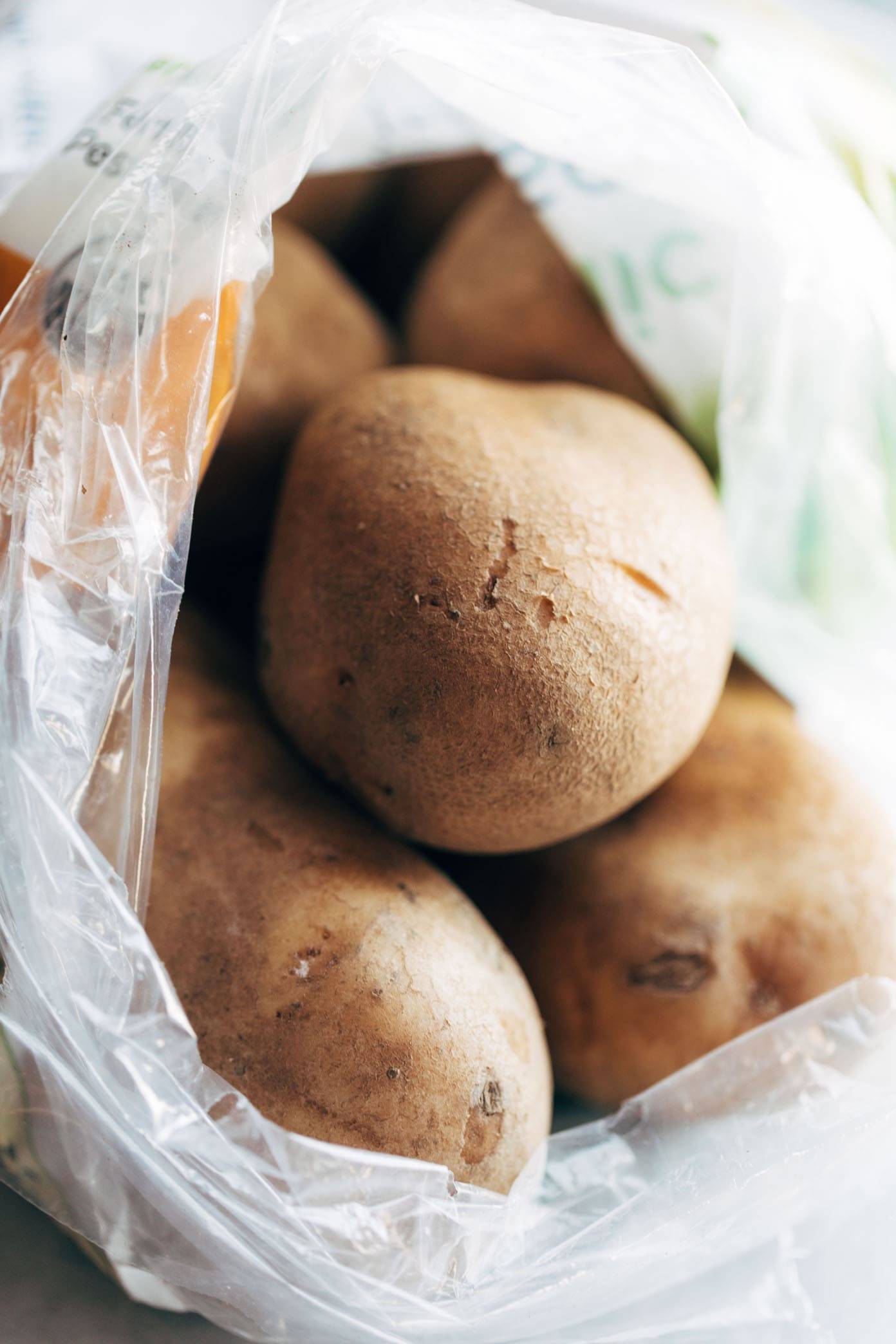 Potatoes in a plastic bag.