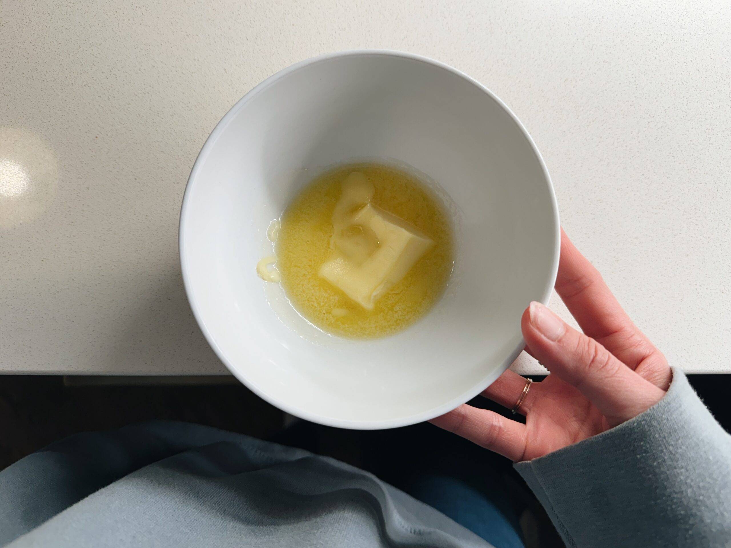 Melted butter in a bowl.