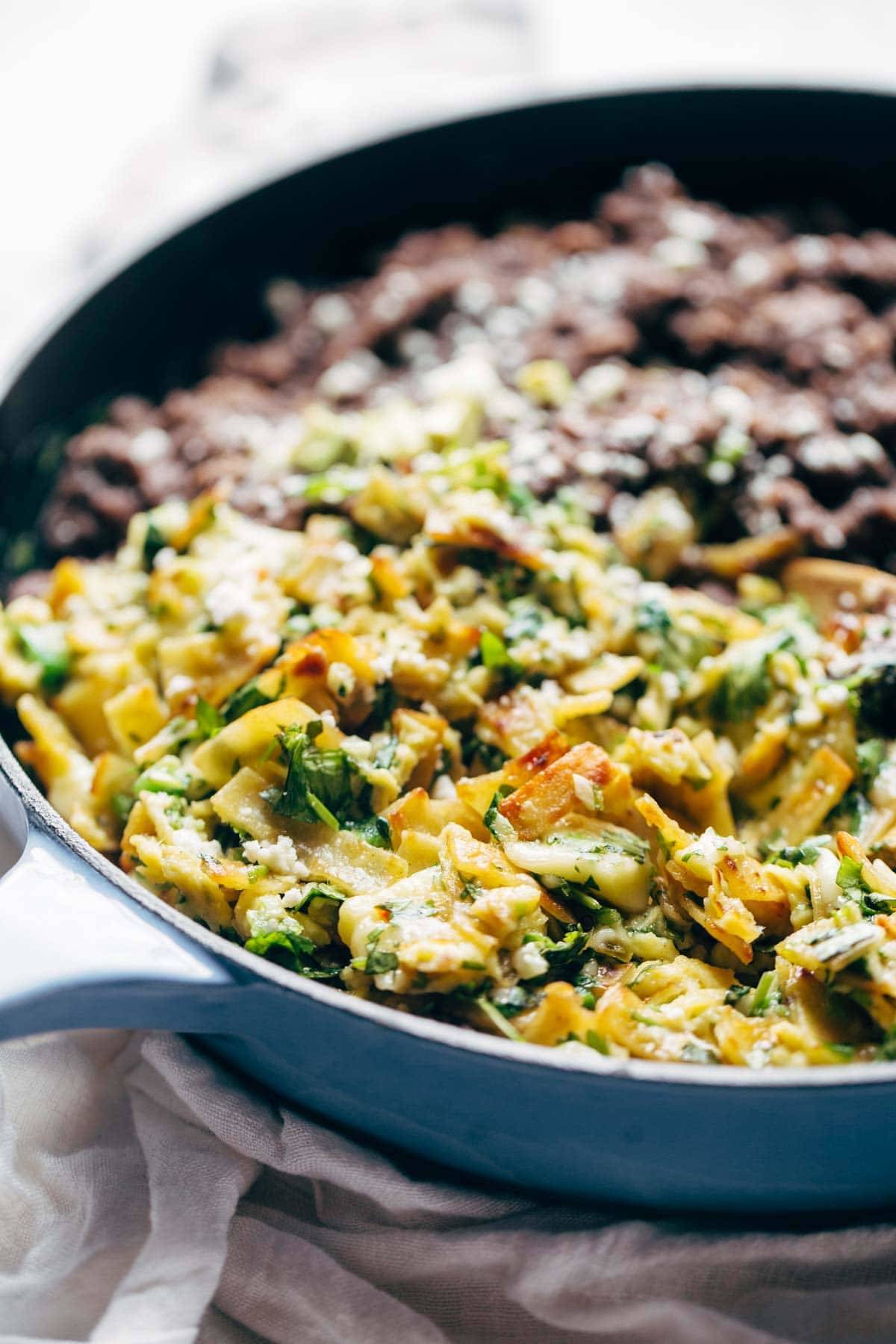 Migas ingredients in a pan.