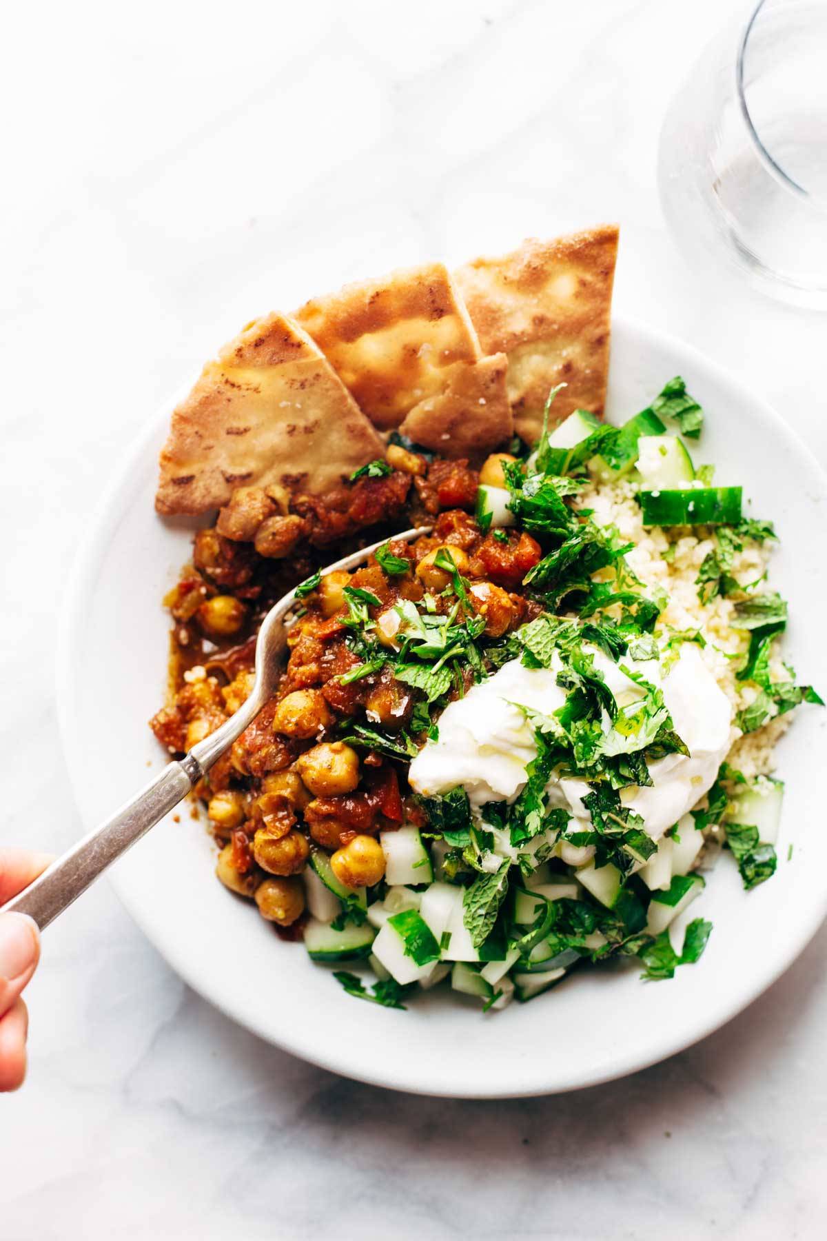 Detox Moroccan Chickpea Glow Bowl with a fork.