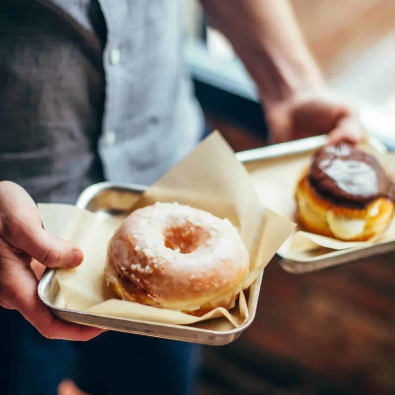 Donuts on plates.