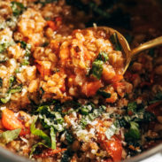 Stewed farro and veggies in a large pot.