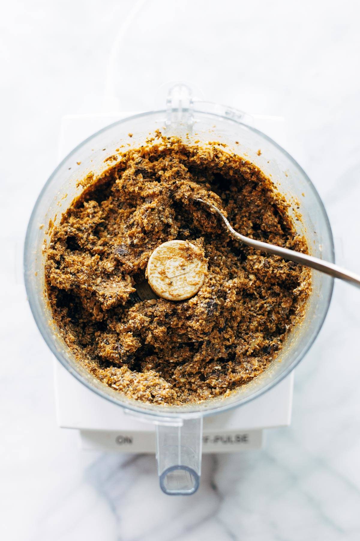 Pumpkin Energy Bites blended in a food processor.