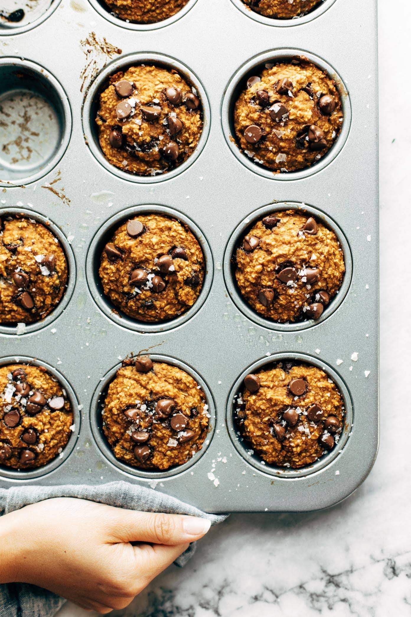 Favorite Pumpkin Muffins: made with oats instead of flour, and maple syrup instead of refined sugar. everyone loves them! | pinchofyum.com 