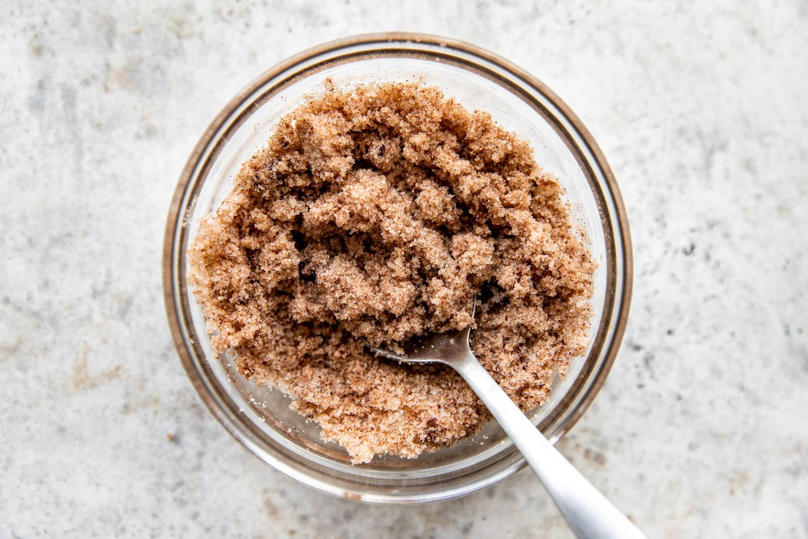 Mixing together brown sugar topping in a bowl.