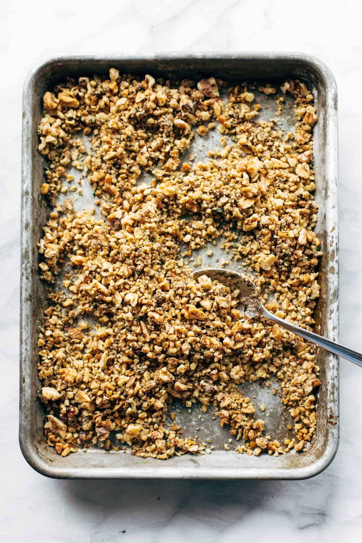 Rosemary walnut crispies on a sheet pan.