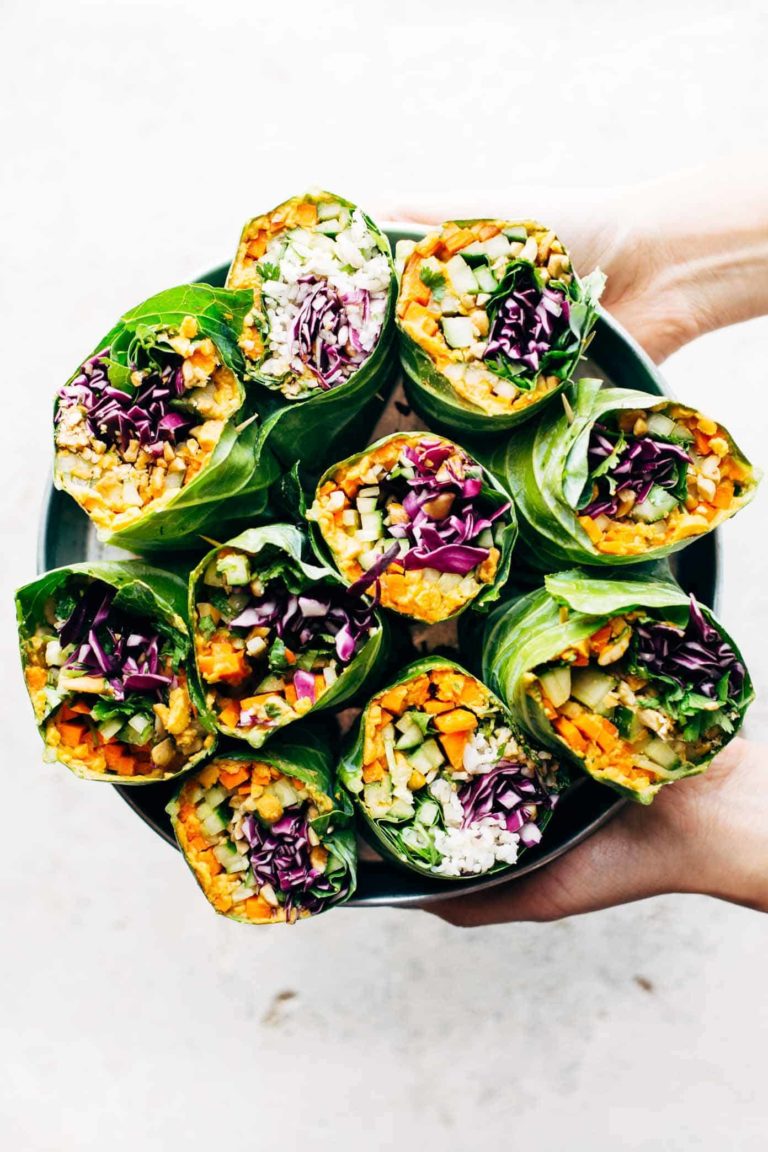 Rainbow rolls arranged on a platter.