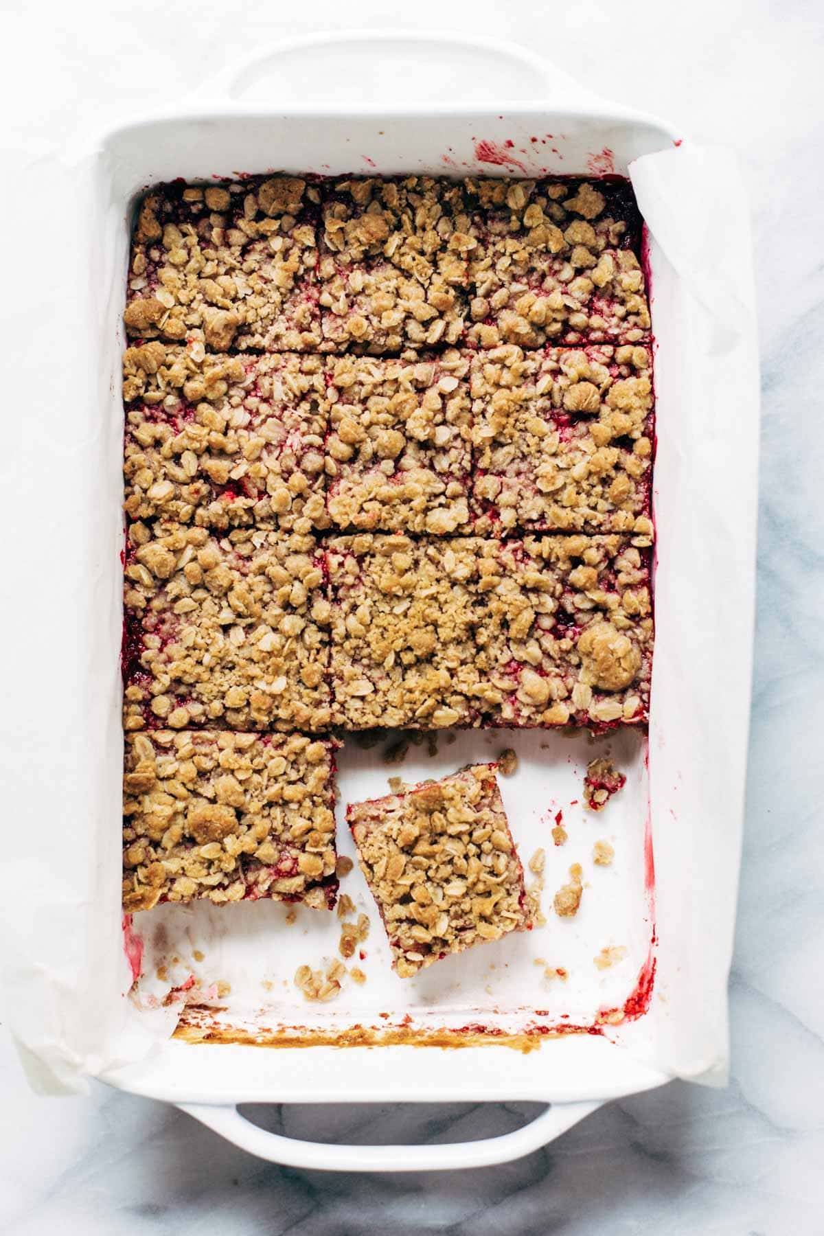 Raspberry Crumble Bars cut in pan.