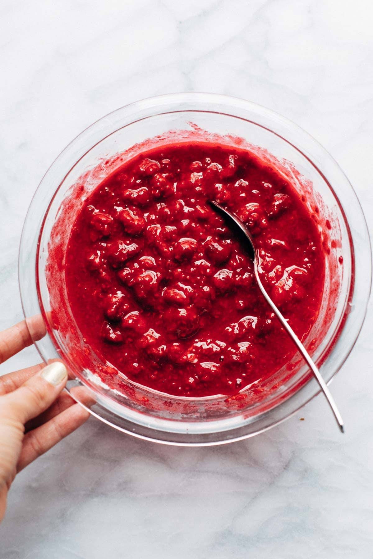 Raspberries in bowl for Raspberry Crumble Bars.