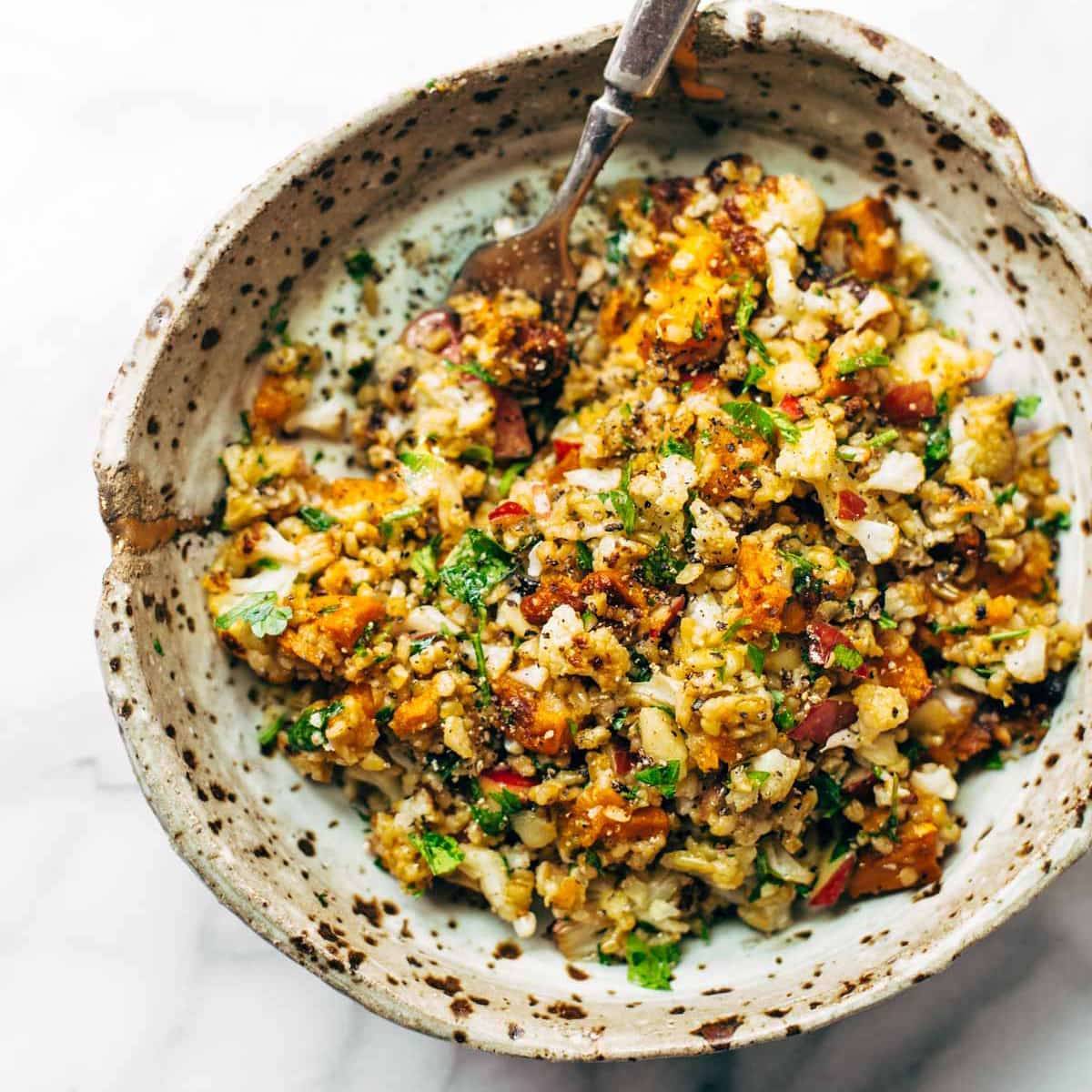 Autumn Glow Salad in a bowl with a fork.