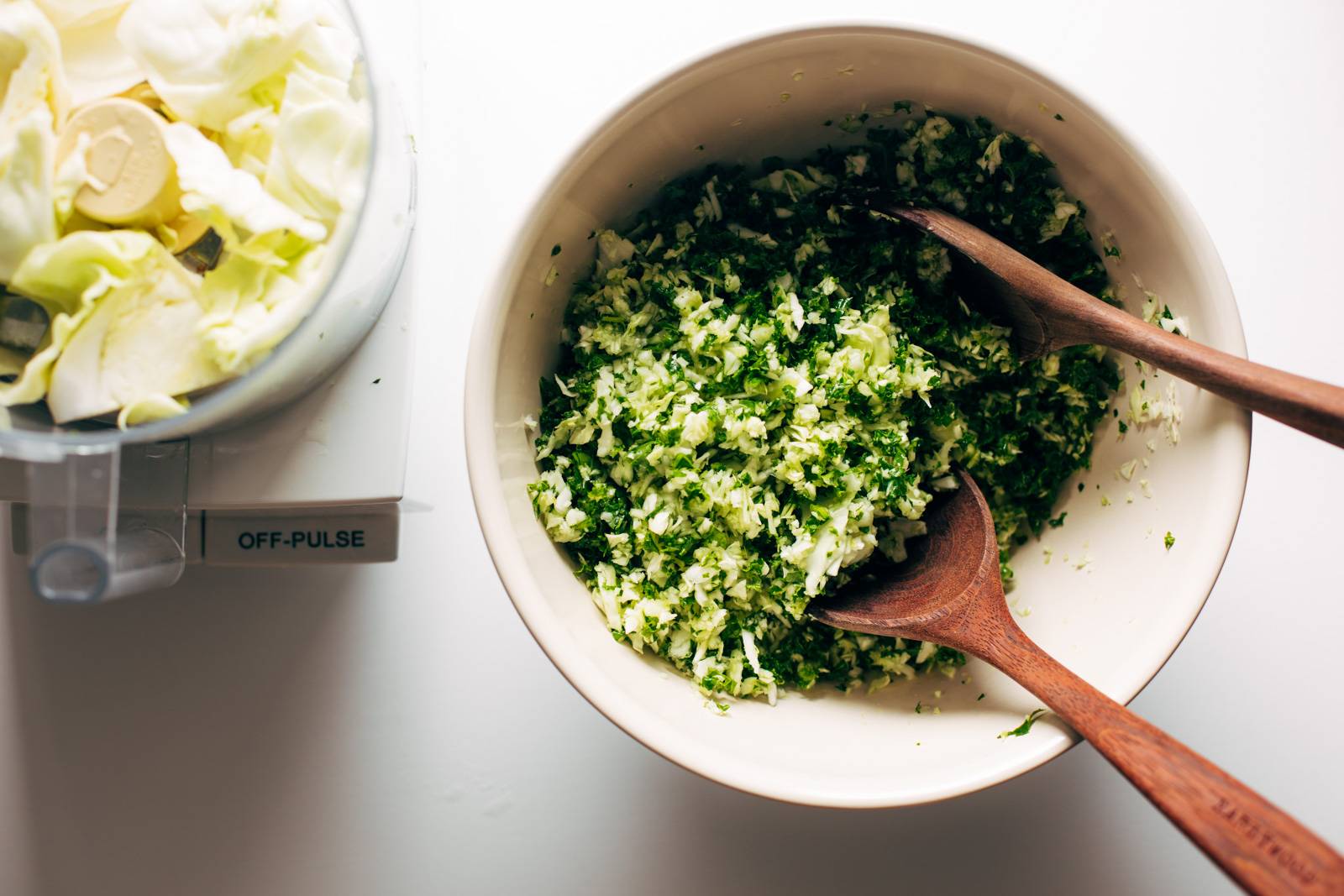 Kale and cabbage finely chopped in a food processor