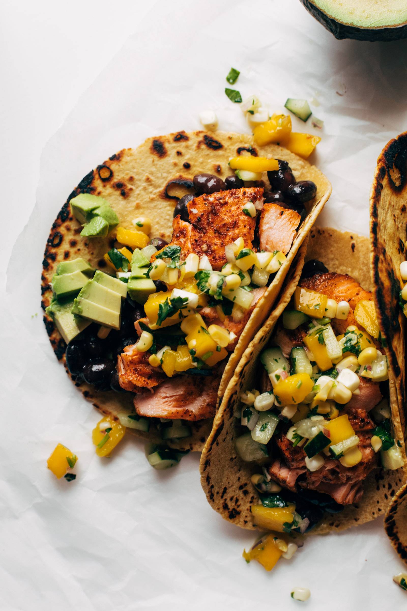 Close-up of salmon tacos with salsa