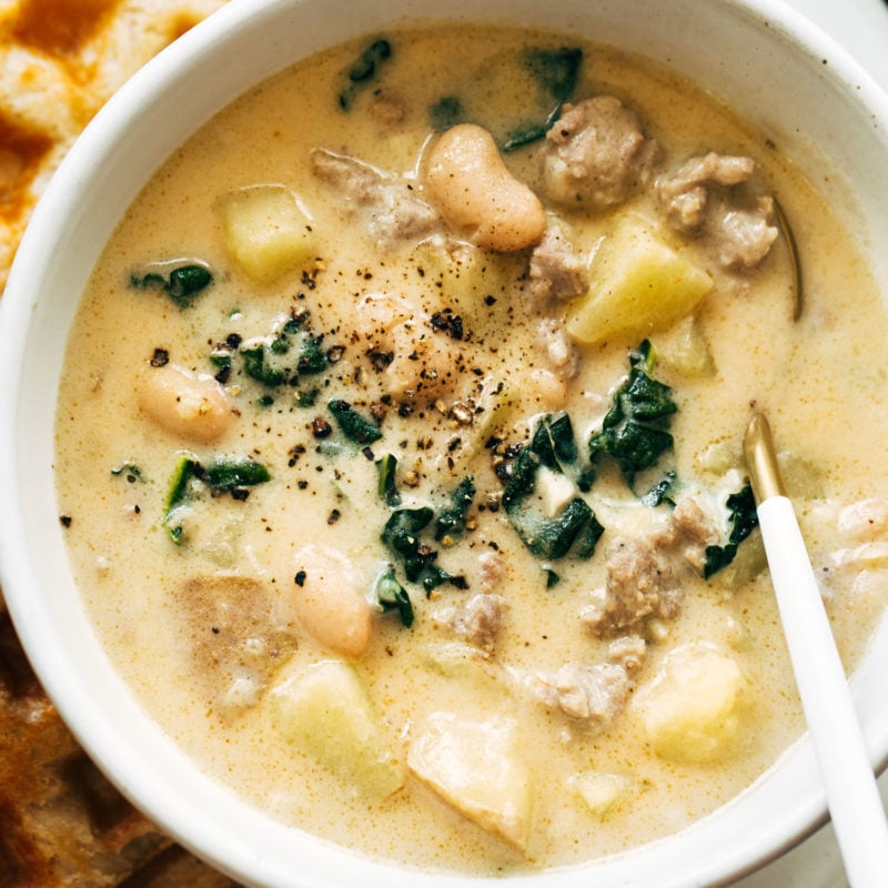 Sausage and white bean soup in a bowl.