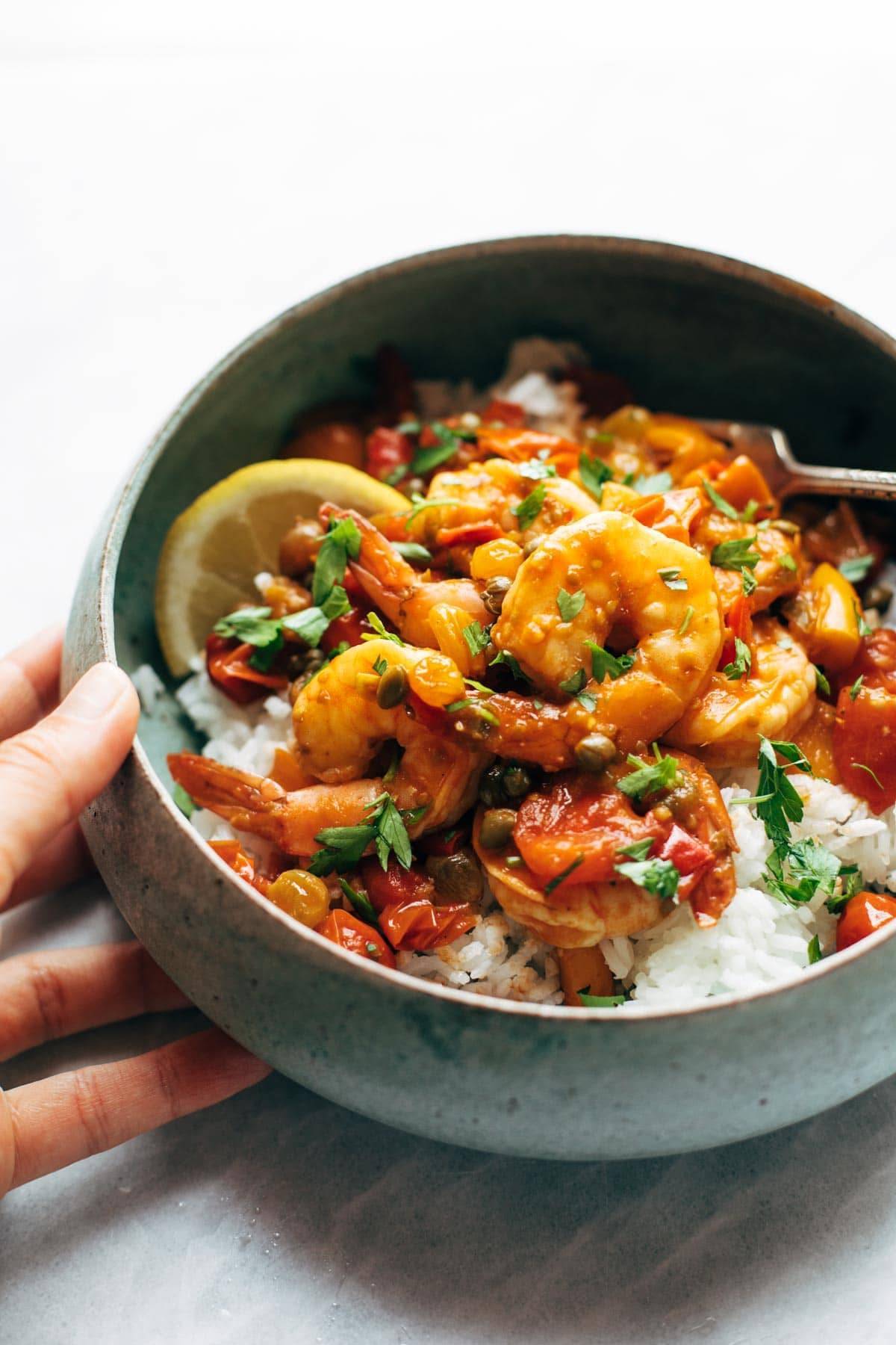 Spicy shrimp veracruz in a bowl with rice.