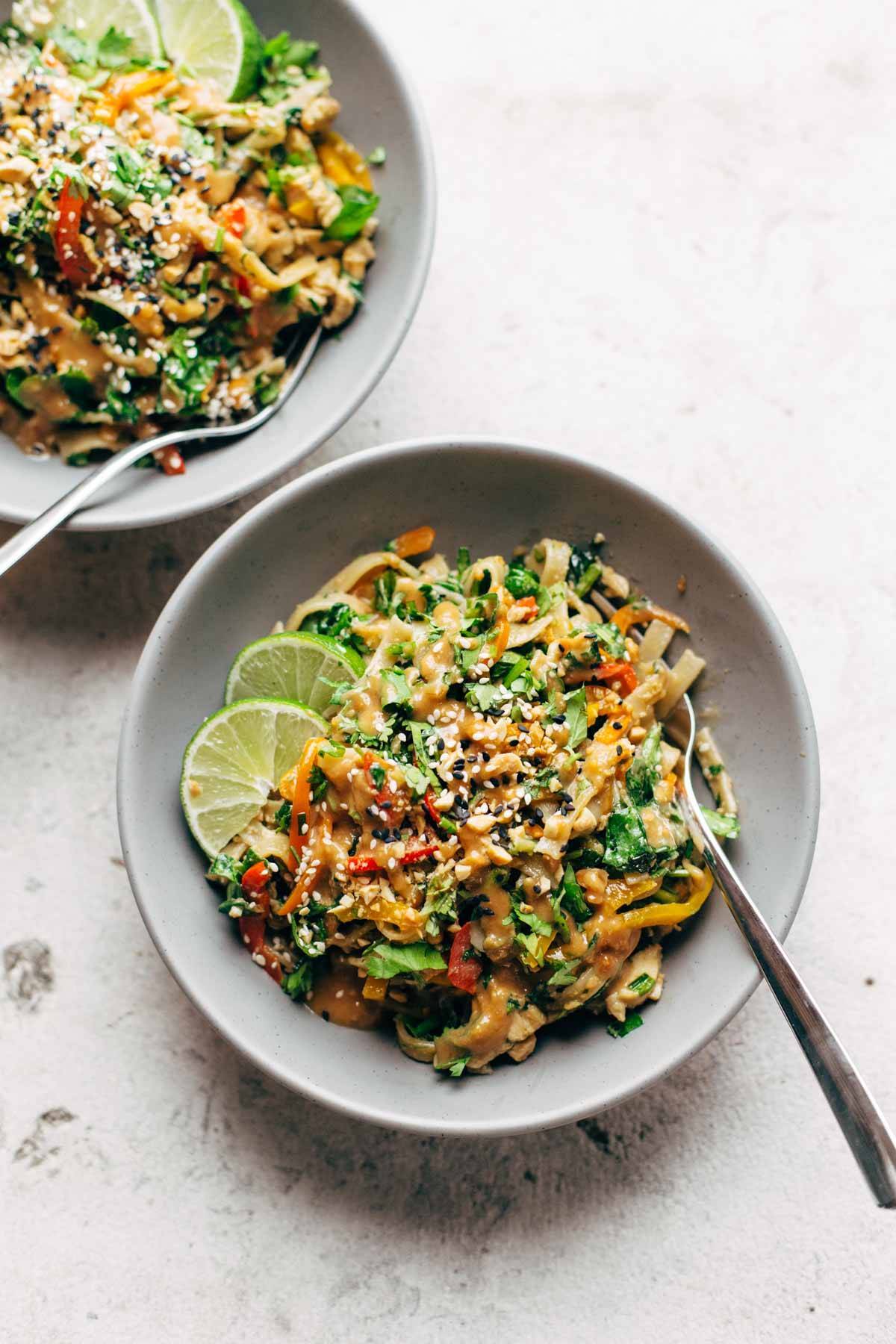 Thai Noodle Salad with Peanut Lime Dressing in a bowl with a fork