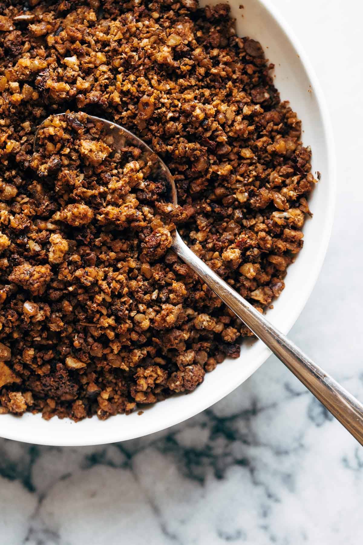 A large bowl of browned walnut taco meat.