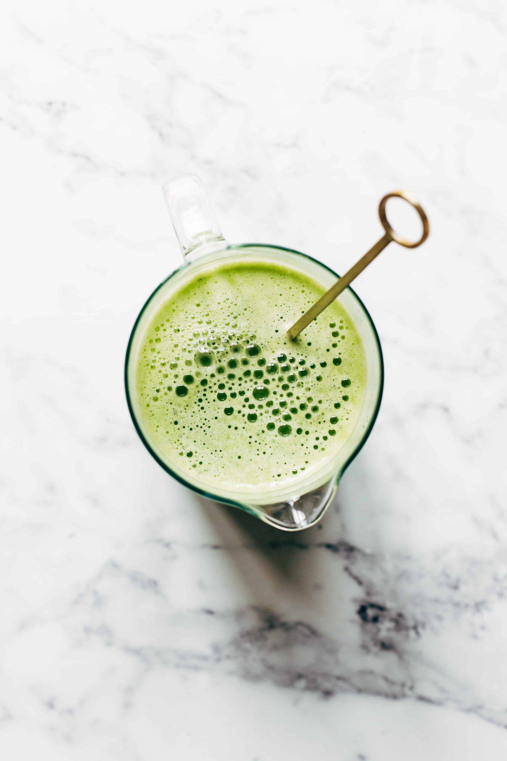 Cucumber agua fresca in a pitcher.