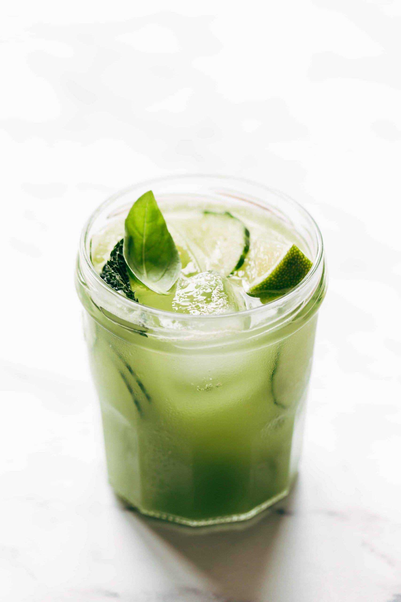 Cucumber agua fresca in a glass.