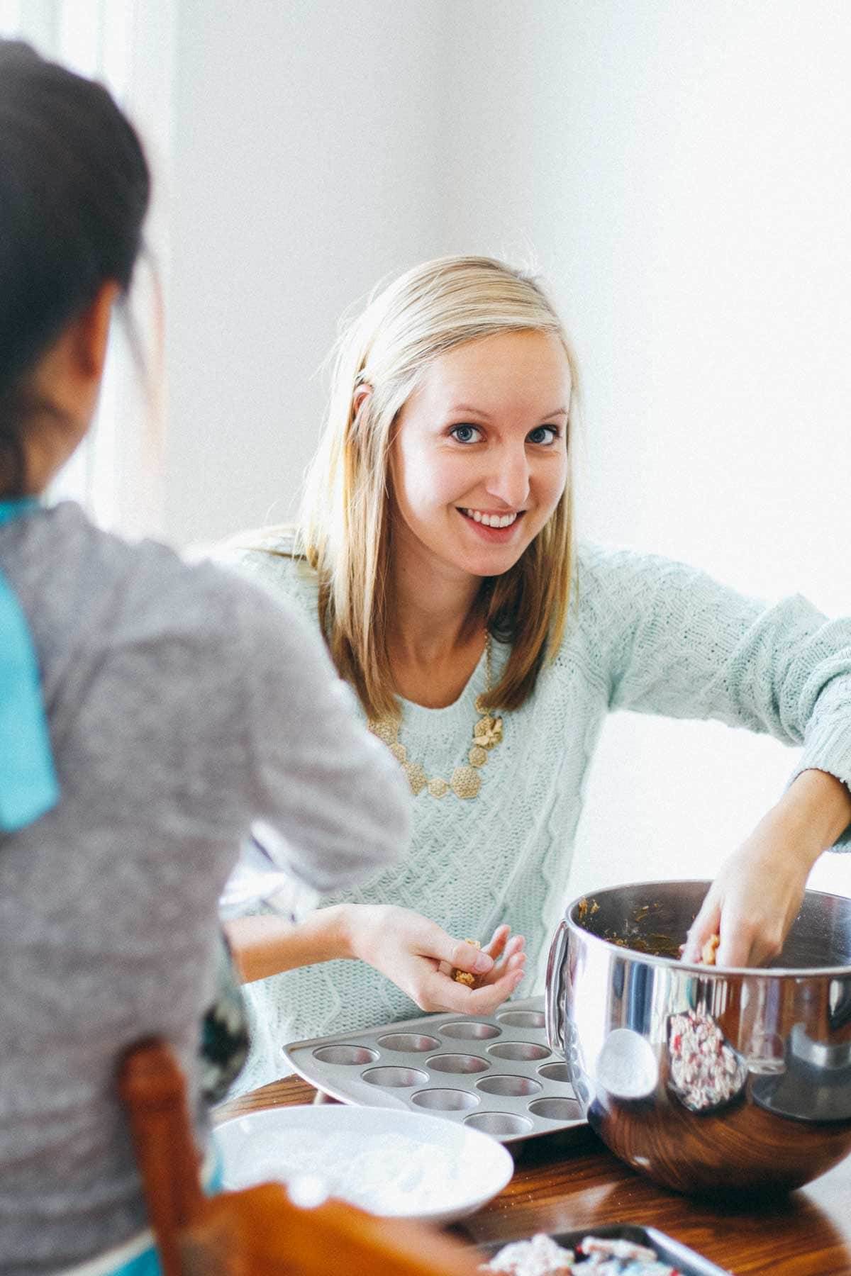 Girl baking cookies.