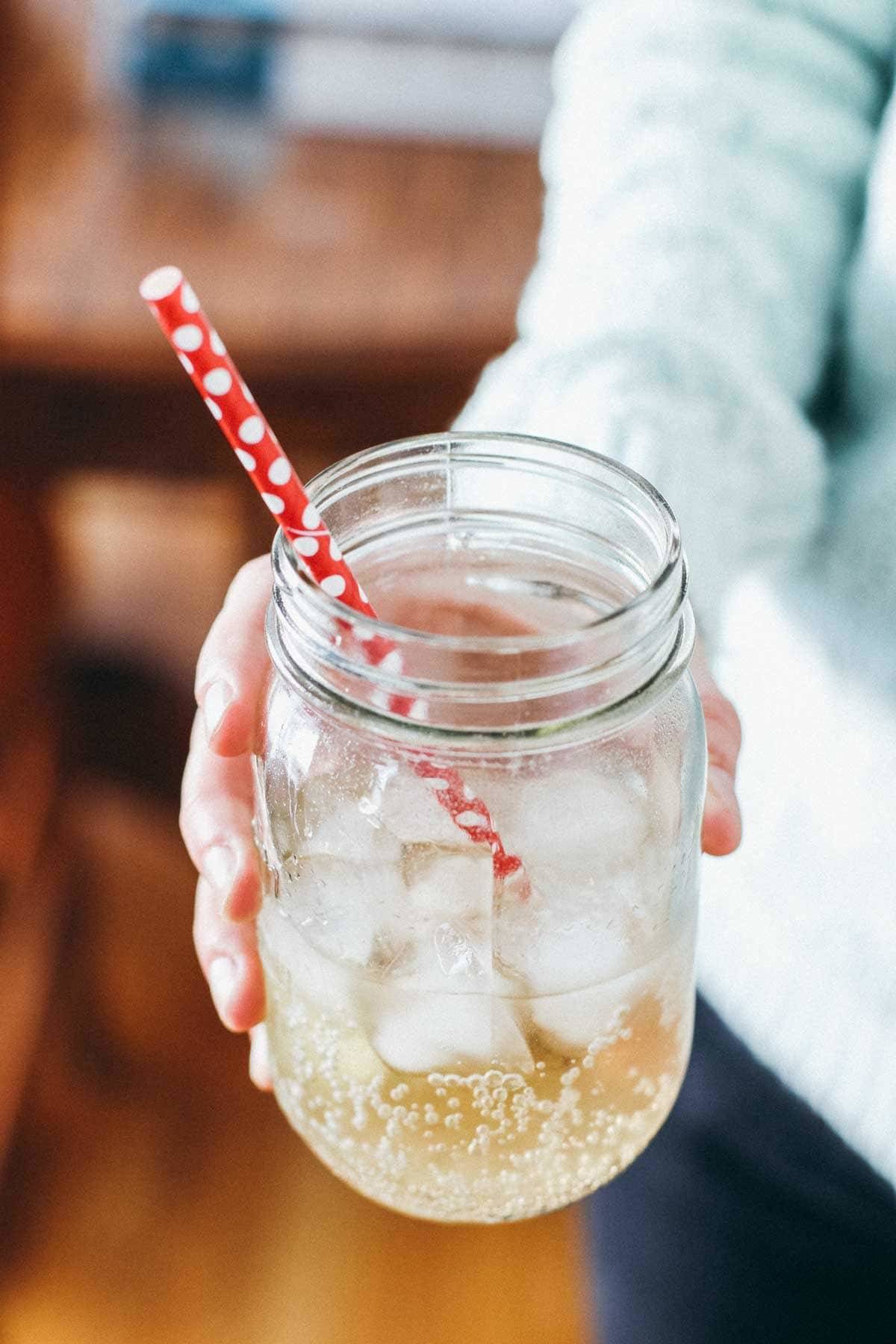 Drink in a jar with a straw.