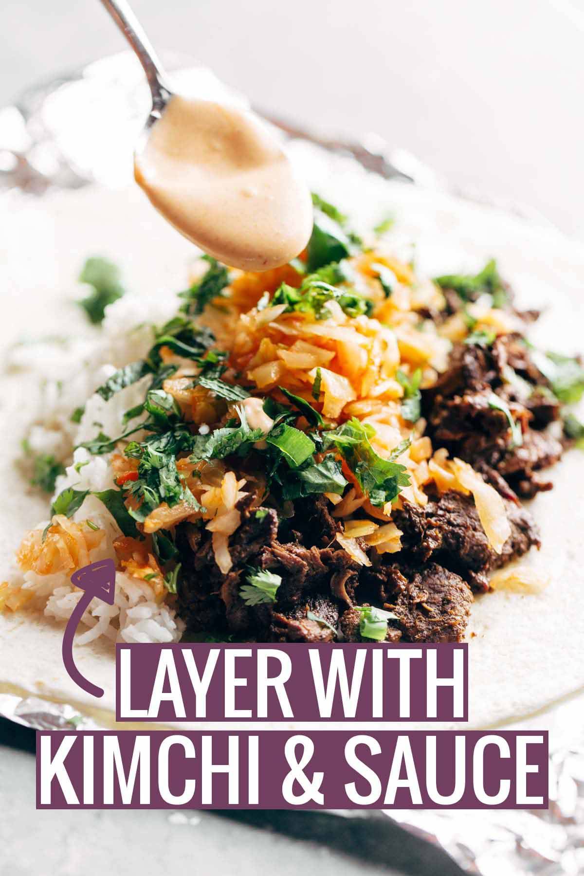 Layering Korean BBQ Burritos | pinchofyum.com