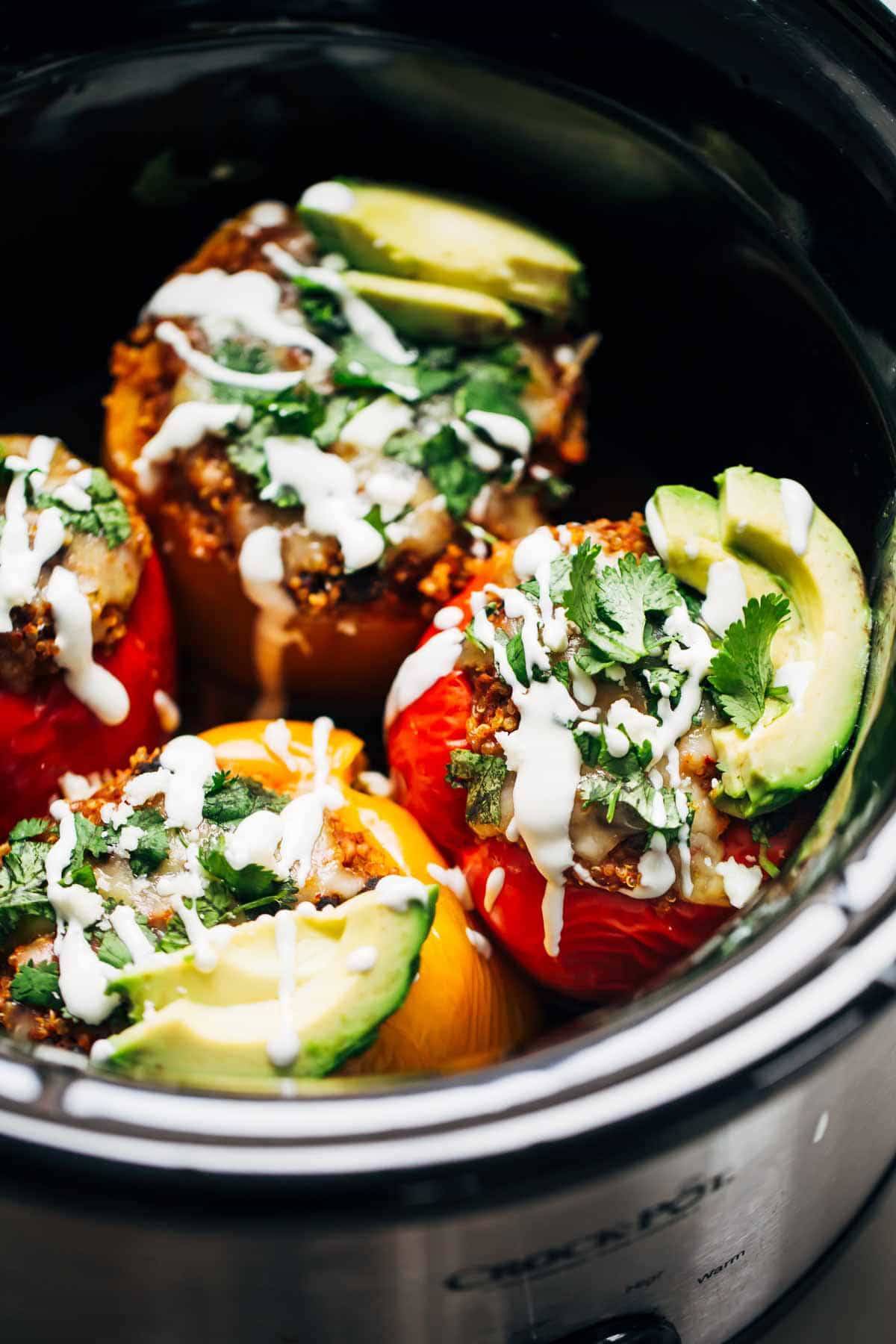 Quinoa Black Bean Crockpot Stuffed Peppers in a slow cooker.