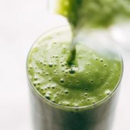 Green Smoothie poured into glass.